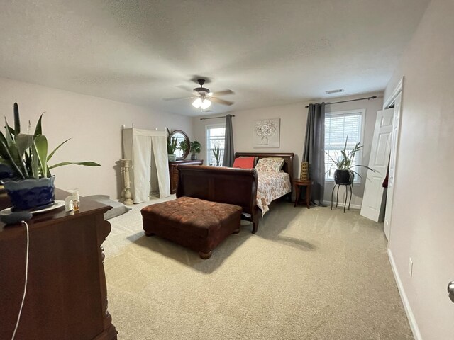 bedroom featuring carpet and ceiling fan