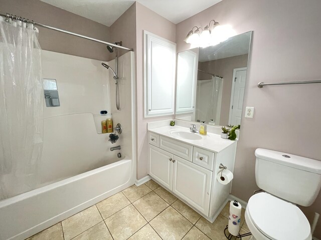 full bathroom with toilet, vanity, tile patterned floors, and shower / bathtub combination with curtain