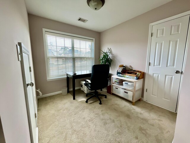 view of carpeted office space