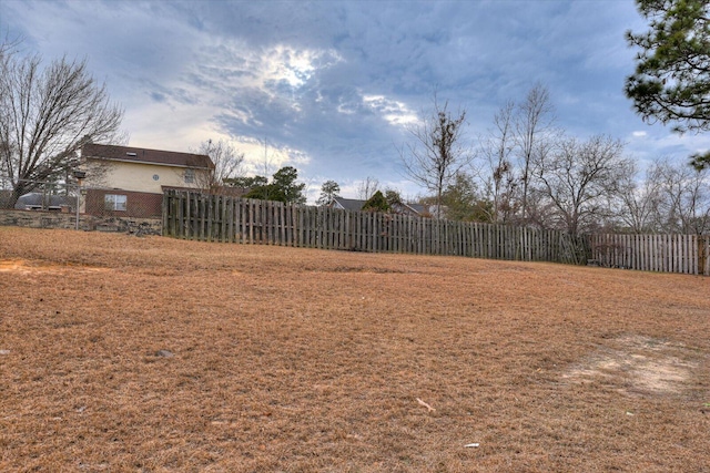 view of yard featuring fence