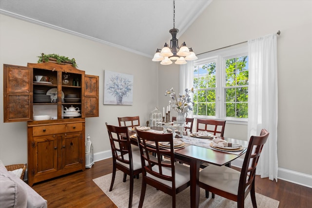 429 Cambridge Cir, Martinez, GA 30907 - dining room featuring a chandelier, ornamental molding, dark wood-style floors, and vaulted ceiling