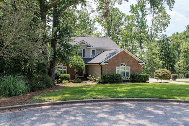 429 Cambridge Cir, Martinez, GA 30907 - view of front of house featuring brick siding, a front lawn, and roof with shingles