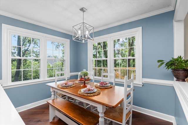 429 Cambridge Cir, Martinez, GA 30907 - dining room featuring a chandelier, dark wood-type flooring, crown molding, and a textured ceiling