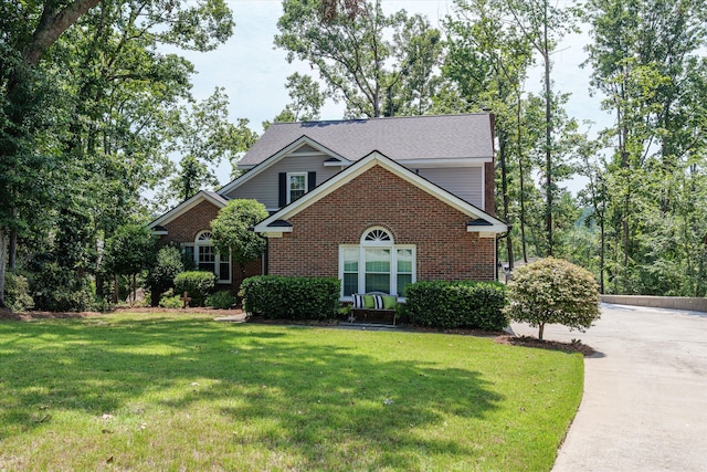 429 Cambridge Cir, Martinez, GA 30907 - traditional home with brick siding and a front lawn