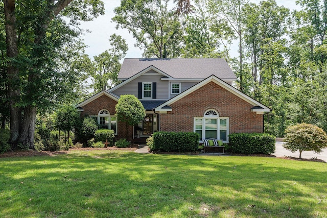 429 Cambridge Cir, Martinez, GA 30907 - traditional-style home featuring brick siding, a front lawn, and a shingled roof