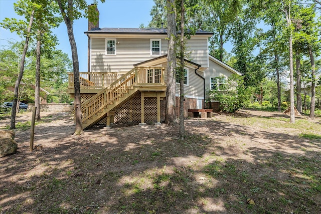 429 Cambridge Cir, Martinez, GA 30907 - back of house featuring stairway, a wooden deck, and a chimney