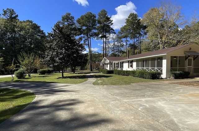 view of home's exterior featuring stucco siding and a yard