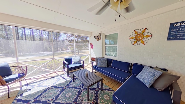 sunroom / solarium with ceiling fan