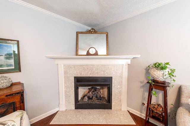 189 Mokateen Ave, North Augusta, SC 29841 - detailed view of a tile fireplace, ornamental molding, and wood finished floors