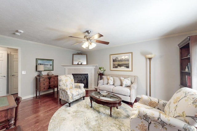 189 Mokateen Ave, North Augusta, SC 29841 - living room featuring ceiling fan, dark wood-style floors, ornamental molding, and a tile fireplace