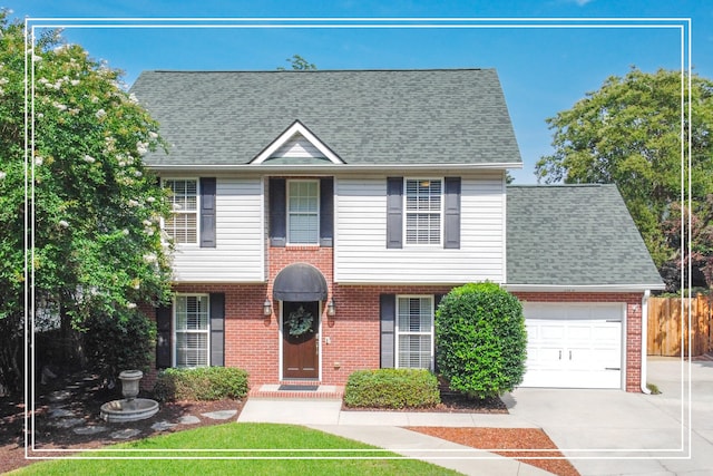 189 Mokateen Ave, North Augusta, SC 29841 - view of front of property with brick siding, an attached garage, driveway, and roof with shingles