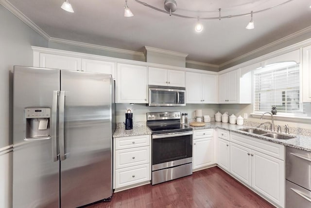 189 Mokateen Ave, North Augusta, SC 29841 - kitchen featuring stainless steel appliances, crown molding, white cabinets, light stone countertops, and dark wood-style flooring