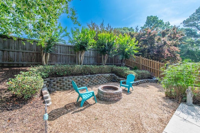 189 Mokateen Ave, North Augusta, SC 29841 - fenced backyard featuring an outdoor fire pit