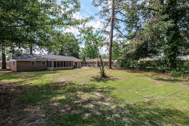 3007 Tallwood Way, Augusta, GA 30906 - view of grassy yard featuring a sunroom