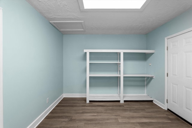 3007 Tallwood Way, Augusta, GA 30906 - spare room featuring attic access, wood finished floors, and a textured ceiling