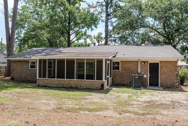 3007 Tallwood Way, Augusta, GA 30906 - rear view of property with a sunroom, brick siding, and a lawn