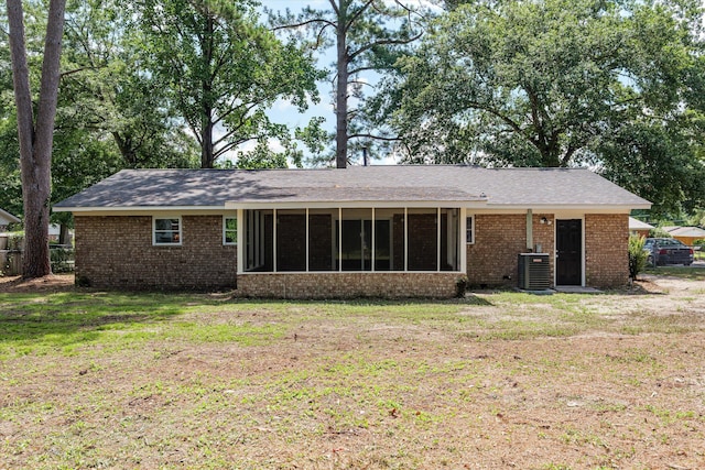 3007 Tallwood Way, Augusta, GA 30906 - rear view of property with a sunroom, a lawn, and brick siding
