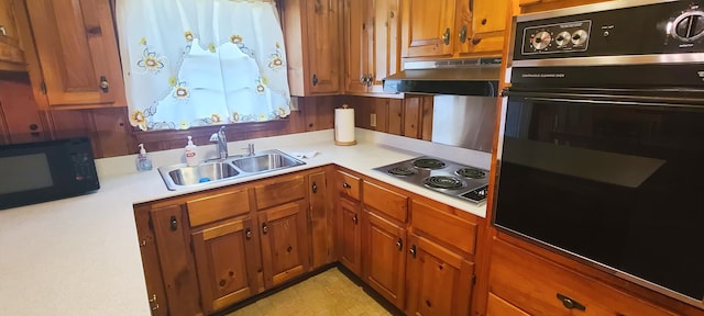 kitchen featuring black appliances and sink