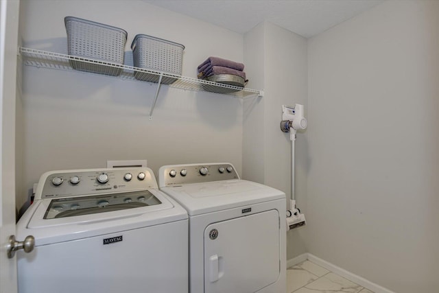 laundry area with washer and dryer