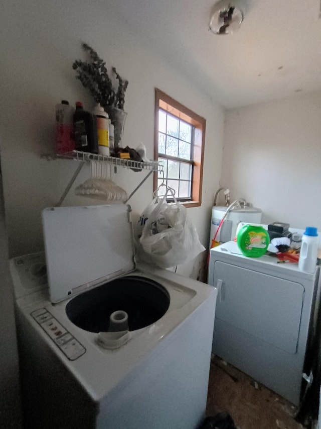 laundry area featuring laundry area and washing machine and dryer