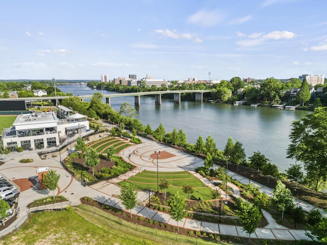 drone / aerial view featuring a water view and a view of city