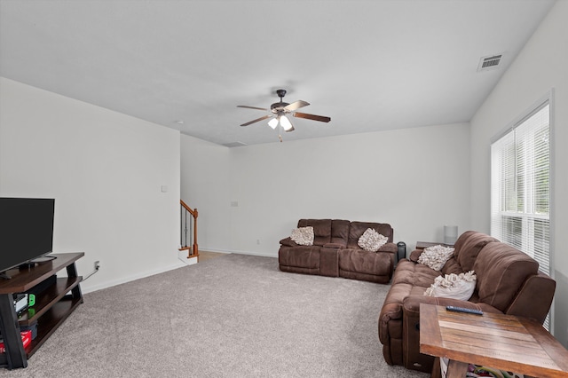 3430 Grove Landing Cir, Grovetown, GA 30813 - living room featuring a ceiling fan, carpet, stairs, and baseboards