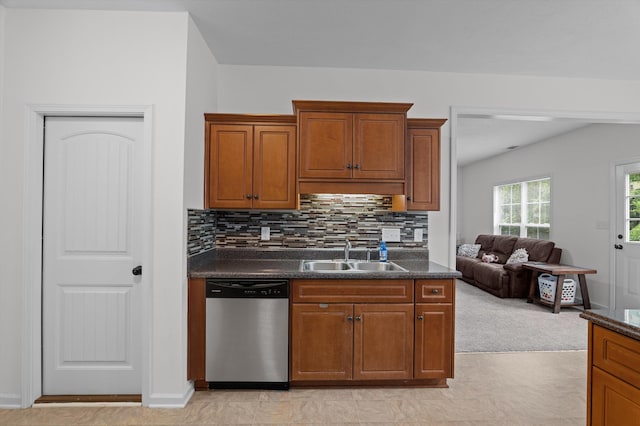 3430 Grove Landing Cir, Grovetown, GA 30813 - kitchen with dishwasher, a sink, backsplash, and brown cabinets