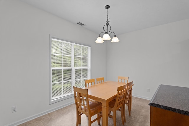 3430 Grove Landing Cir, Grovetown, GA 30813 - dining area with a chandelier and baseboards