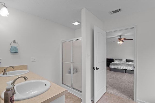 3430 Grove Landing Cir, Grovetown, GA 30813 - bathroom with a shower stall, ensuite bath, a ceiling fan, and double vanity