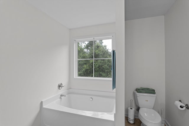 3430 Grove Landing Cir, Grovetown, GA 30813 - full bathroom featuring a bath, toilet, and baseboards