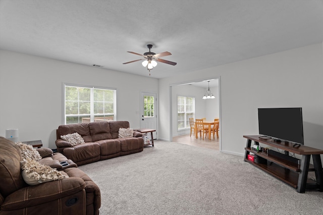 3430 Grove Landing Cir, Grovetown, GA 30813 - living area with plenty of natural light, carpet, ceiling fan, and a chandelier