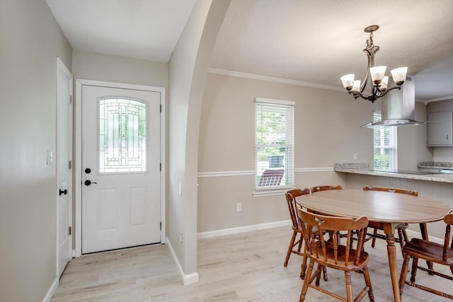 4122 Langley St, Martinez, GA 30907 - dining area with a chandelier, light wood-style flooring, and crown molding