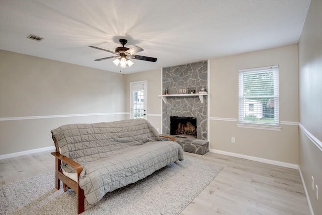 4122 Langley St, Martinez, GA 30907 - living room with wood finished floors, plenty of natural light, and a fireplace