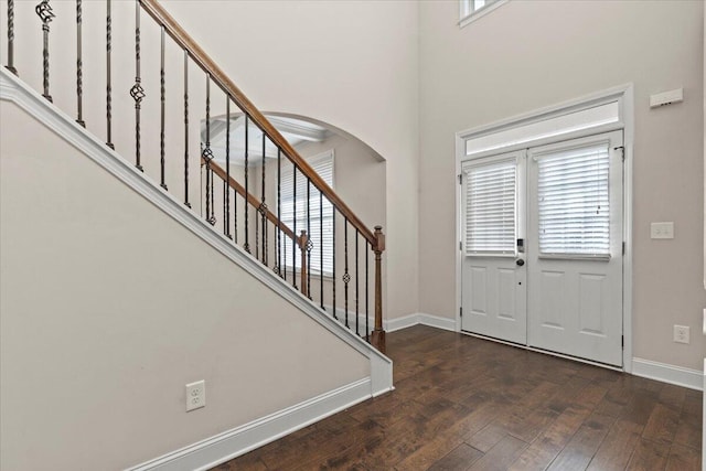 entryway featuring dark wood-type flooring