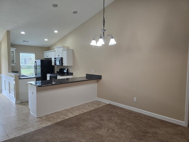 412 York Ln, Augusta, GA 30909 - kitchen featuring black appliances, a peninsula, white cabinets, dark countertops, and a chandelier