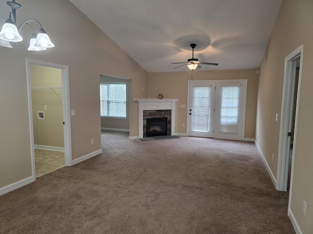 412 York Ln, Augusta, GA 30909 - unfurnished living room with carpet, a ceiling fan, a chandelier, lofted ceiling, and a fireplace