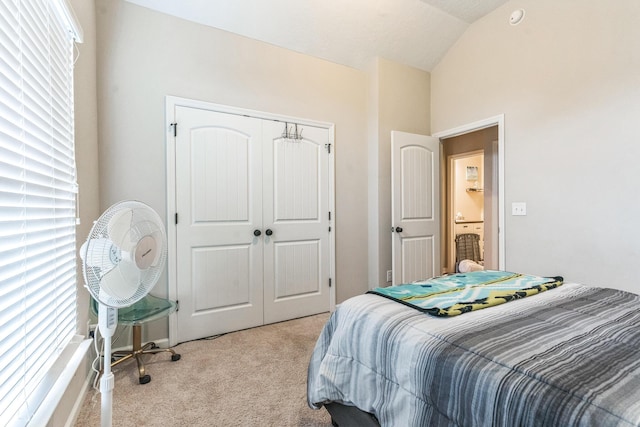 7105 Summerton Dr, Augusta, GA 30909 - bedroom featuring a closet, light colored carpet, and lofted ceiling