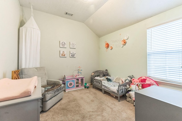 7105 Summerton Dr, Augusta, GA 30909 - bedroom with visible vents, multiple windows, vaulted ceiling, and carpet floors