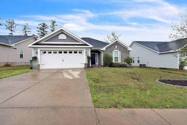 7105 Summerton Dr, Augusta, GA 30909 - ranch-style home featuring central AC, an attached garage, driveway, and a front lawn