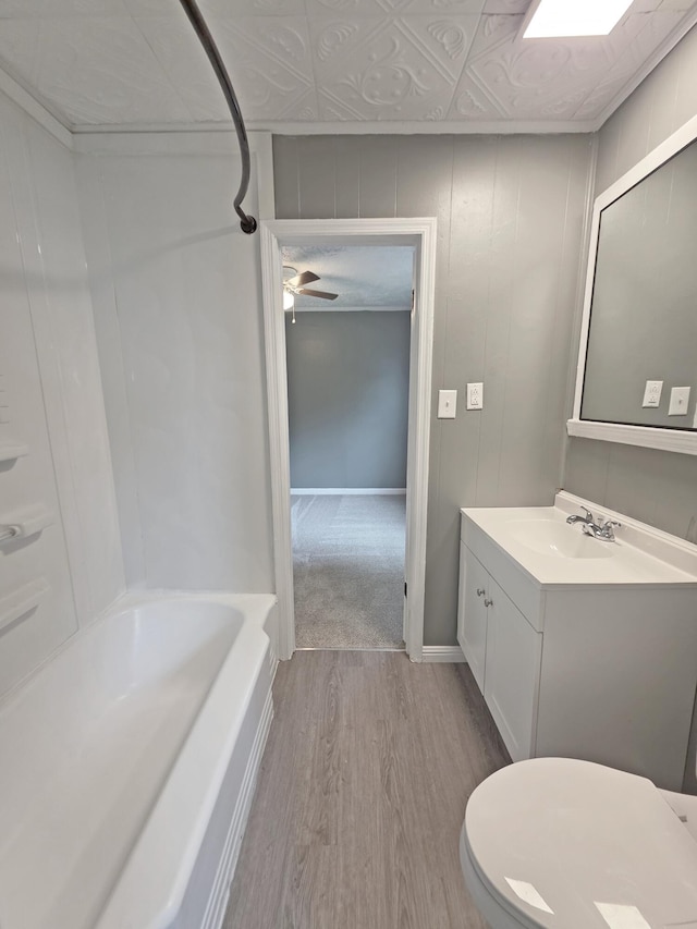 1005 Weston St, North Augusta, SC 29841 - bathroom featuring wood finished floors, vanity, and a ceiling fan