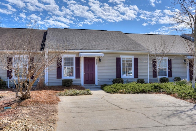 view of front of home with roof with shingles