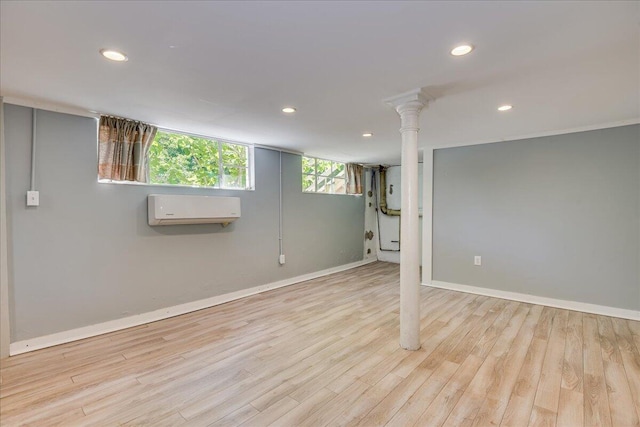 844 Heard Ave, Augusta, GA 30904 - below grade area featuring a wall mounted AC, recessed lighting, and wood finished floors