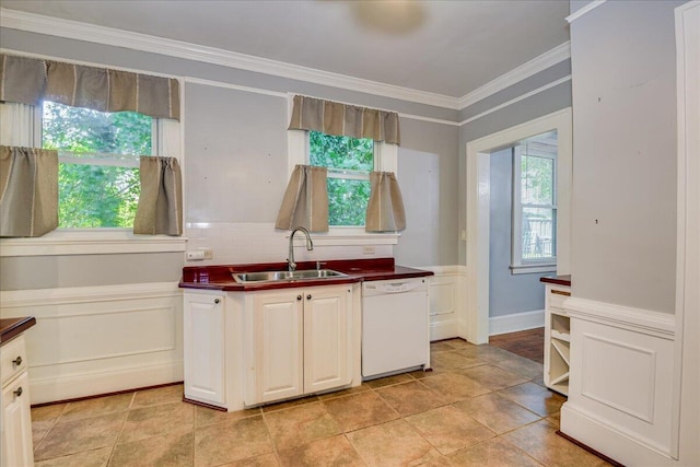 844 Heard Ave, Augusta, GA 30904 - kitchen with white dishwasher, dark countertops, backsplash, and ornamental molding