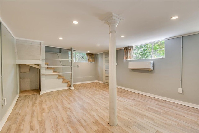 844 Heard Ave, Augusta, GA 30904 - below grade area featuring a wall mounted air conditioner, wood finished floors, recessed lighting, healthy amount of natural light, and stairs