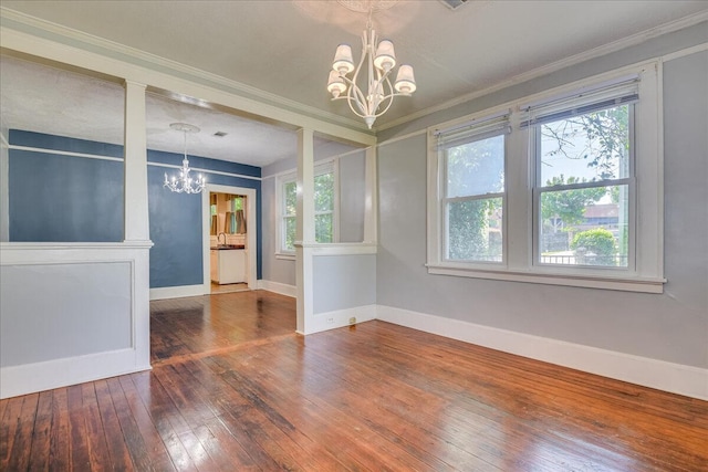 844 Heard Ave, Augusta, GA 30904 - spare room featuring a chandelier, hardwood / wood-style flooring, and crown molding
