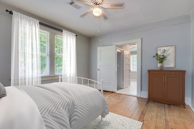 844 Heard Ave, Augusta, GA 30904 - bedroom featuring light wood finished floors, a ceiling fan, and ensuite bathroom