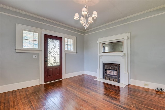844 Heard Ave, Augusta, GA 30904 - entrance foyer featuring wood-type flooring, a chandelier, a fireplace with flush hearth, and crown molding