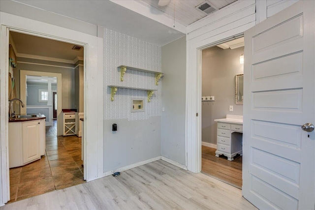 844 Heard Ave, Augusta, GA 30904 - washroom featuring crown molding, hookup for a washing machine, light wood-style floors, and a ceiling fan