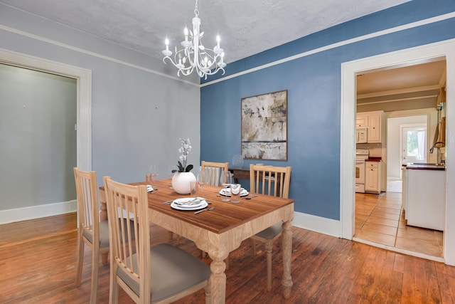 844 Heard Ave, Augusta, GA 30904 - dining room featuring a chandelier and hardwood / wood-style flooring