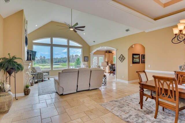 139 Laurens Dr, Mccormick, SC 29835 - living room with arched walkways, ceiling fan, a chandelier, recessed lighting, and stone tile floors
